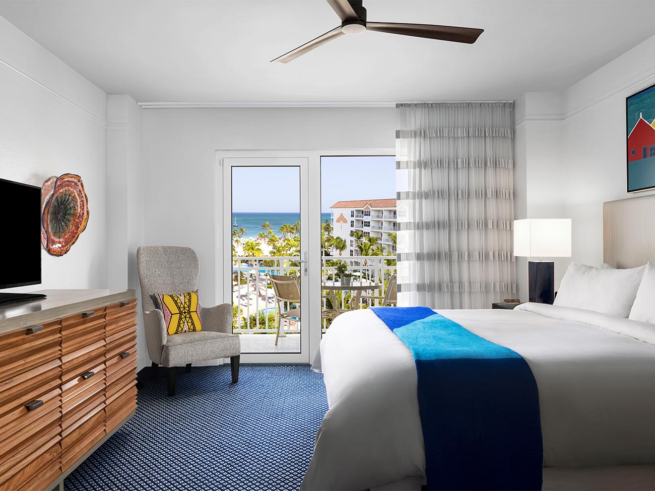 Primary Bedroom & Balcony (1- or 2-Bedroom Villa)